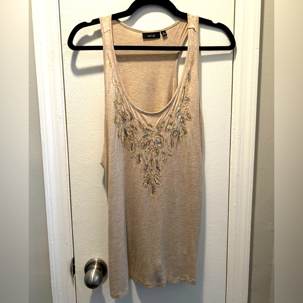 Cream colored tank featuring a gold beaded & sequin design.